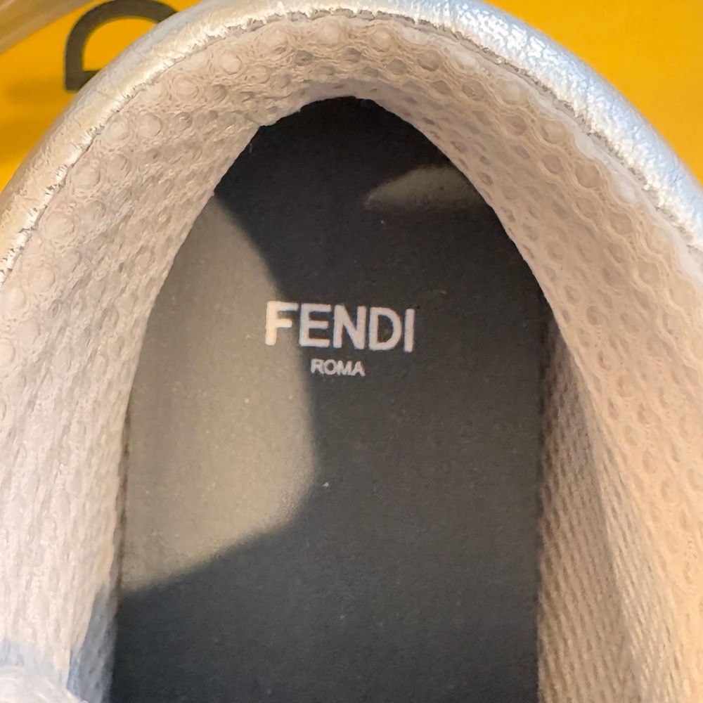 FENDI Metallic Nappa
MacroFFEmbossedHigh‎ Top Sneakers
38 Silver - Picture 3 of 12